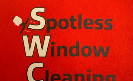 Red background with black and white text reading 'Spotless Window Cleaning' and a squeegee icon.